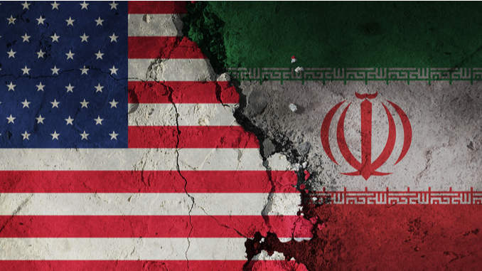 United States and Iran flags collide