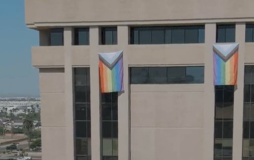 Gov. Hobbs Hangs Four ‘Progress’ Pride Flags From Office