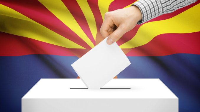 ballot box with Arizona flag in background
